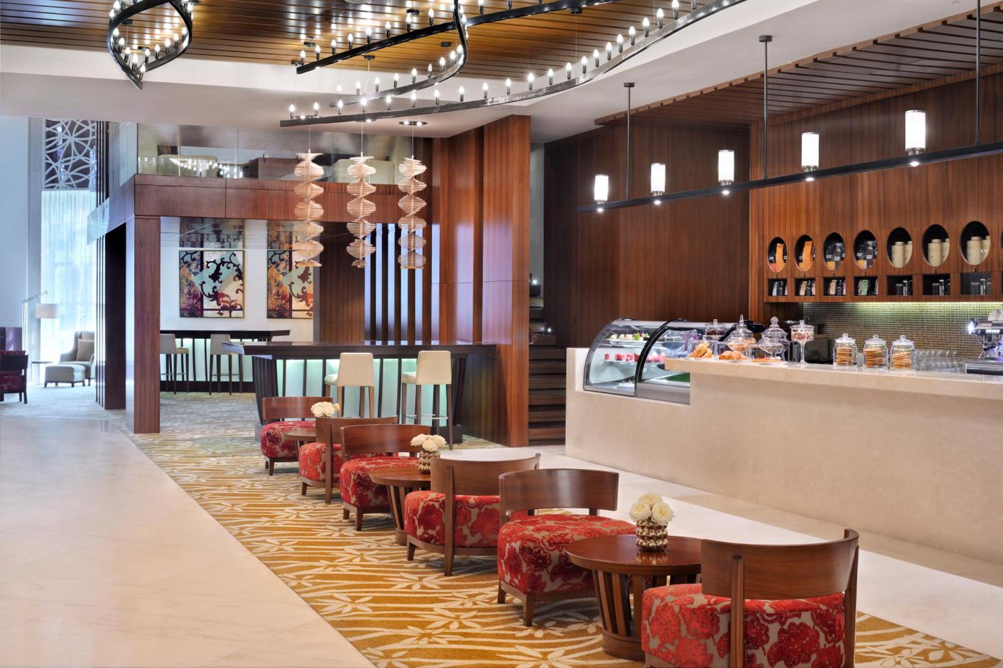 Marriott Executive Apartments Al Jaddaf, Dubái Exterior foto The Lounge at the airport